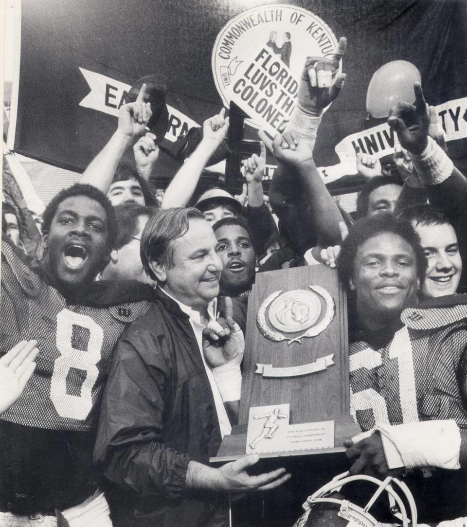 Roy Kidd celebrates with his players after Eastern Kentucky won the 1979 NCAA Division I-AA national championship. The Colonels won a second title under Kidd in 1982.