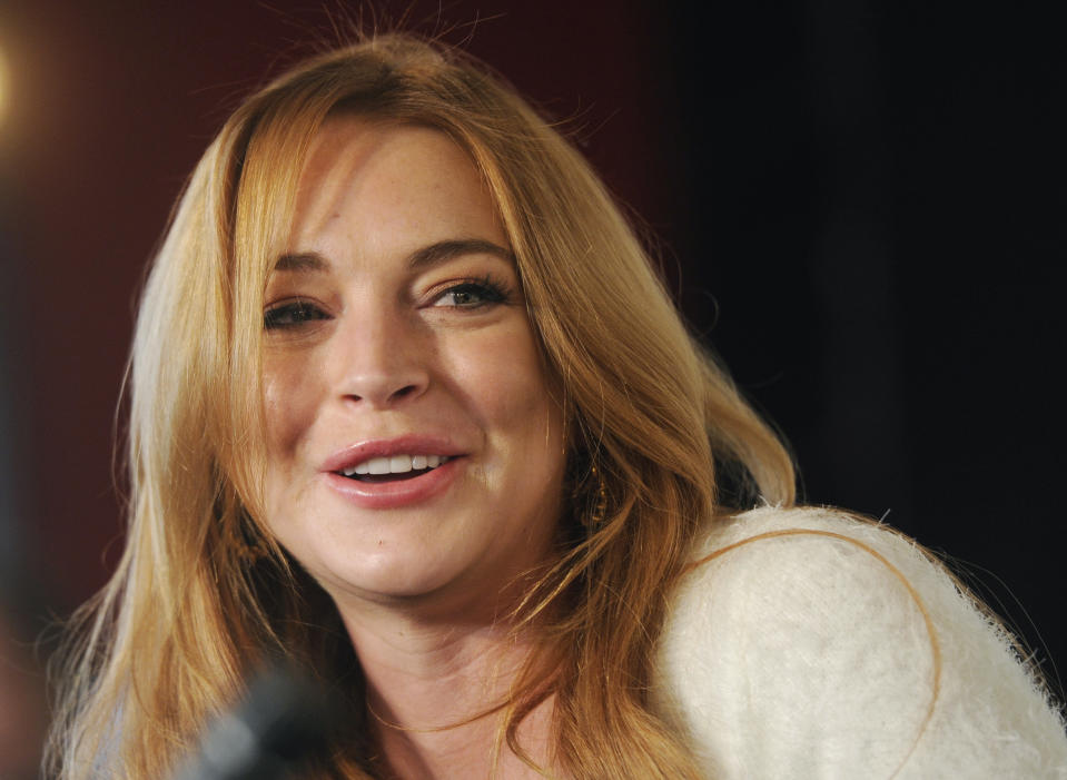 FILE - In this Jan. 20, 2014 file photo, actress Lindsay Lohan addresses reporters during a news conference at the 2014 Sundance Film Festival in Park City, Utah. Lohan says she suffered a miscarriage during the taping of Sunday’s final episode of her OWN cable channel reality TV series, “Lindsay." (Photo by Chris Pizzello/Invision/AP, File)