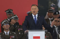 Polish President Andrzej Duda delivers a speech during the ceremony marking the Polish Army Day in Warsaw, Poland, Monday, Aug. 15, 2022. The Polish president and other officials marked their nation's Armed Forces Day holiday Monday alongside the U.S. army commander in Europe and regular American troops, a symbolic underlining of NATO support for members on the eastern front as Russia wages war nearby in Ukraine. (AP Photo/Michal Dyjuk)