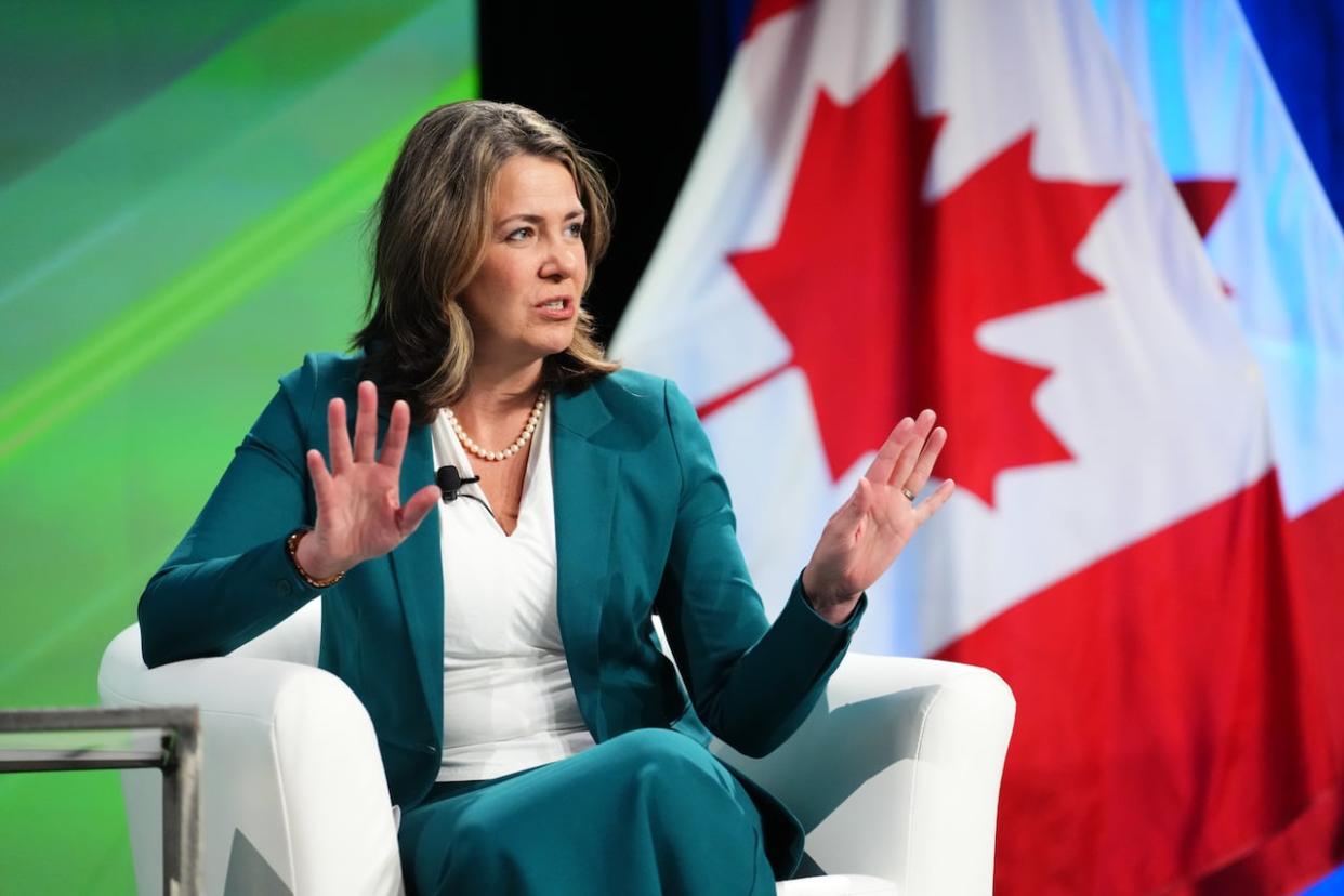 Alberta Premier Danielle Smith says she's disturbed by the home heating oil carbon tax exemption, saying it creates a divide in the country.  (Sean Kilpatrick/The Canadian Press - image credit)