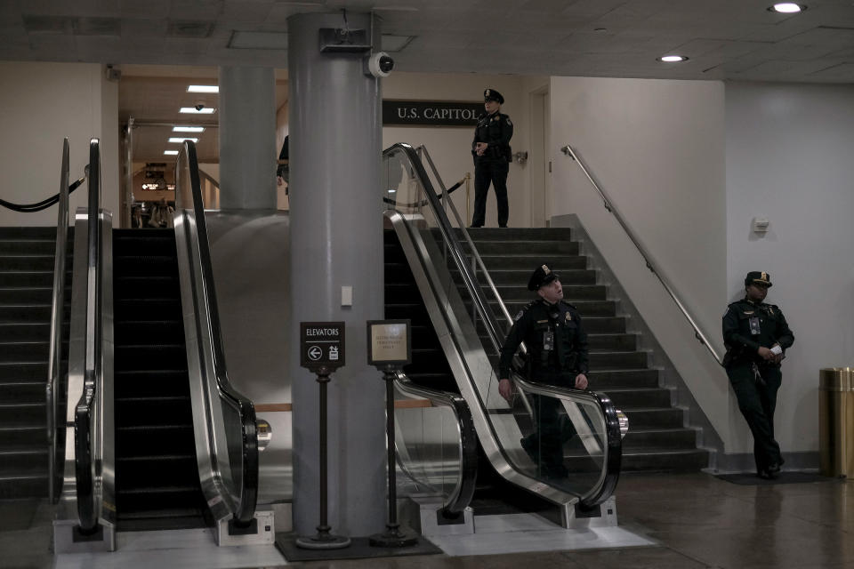 Capitol Hill police stand guard at the senate subway during the senate impeachment trial at the Capitol in Washington, D.C, on Jan. 29, 2020. | Gabriella Demczuk for TIME
