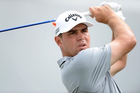 Sep 5, 2014; Cherry Hills Village, CO, USA; Gary Woodland tees off from the 1st hole during the second round of the BMW Championship at Cherry Hills Country Club. Mandatory Credit: Ron Chenoy-USA TODAY Sports