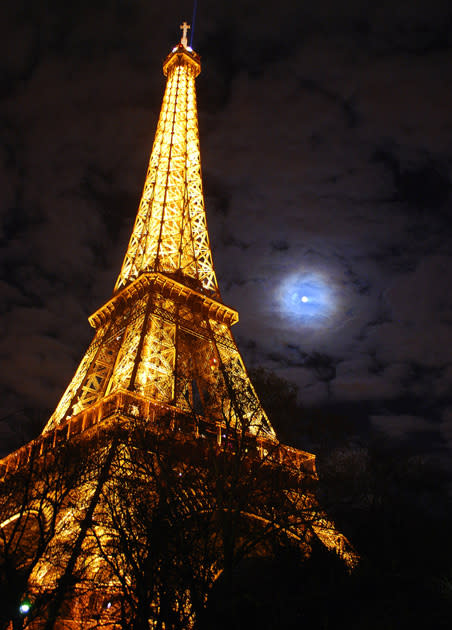 <p><b>Eiffel by moonlight:</b> It is named after the engineer Gustave Eiffel, whose company designed and built the tower. Eiffel had a permit for the tower to stand for 20 years; it was to be dismantled in 1909 but it proved crucial for war time communication. Photo by <a href="http://www.flickr.com/photos/saparajit/" rel="nofollow noopener" target="_blank" data-ylk="slk:Saparjit;elm:context_link;itc:0;sec:content-canvas" class="link ">Saparjit</a>.</p>