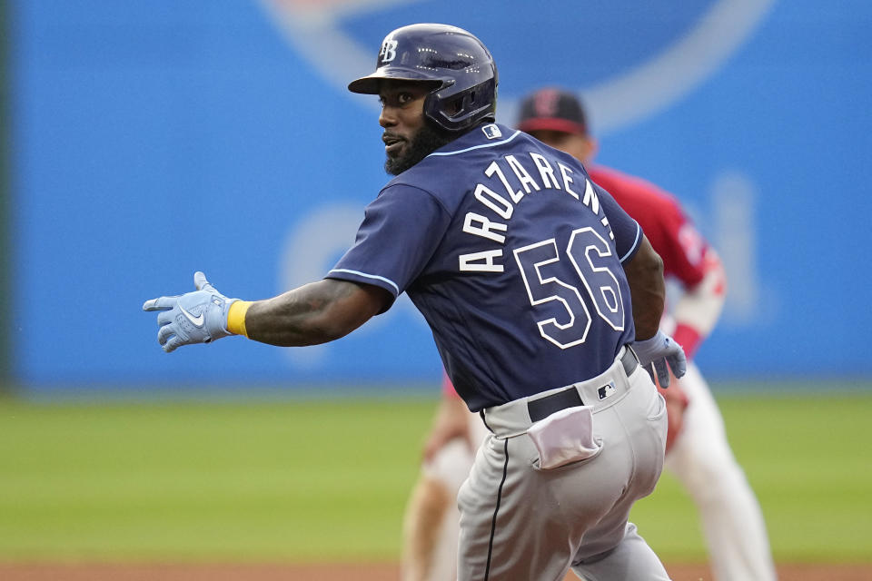 Tampa Bay Rays' Randy Arozarena (56) is caught in a rundown between first and second base in the fifth inning of a baseball game against the Cleveland Guardians, Saturday, Sept. 2, 2023, in Cleveland. Arozarena was out on the play. (AP Photo/Sue Ogrocki)