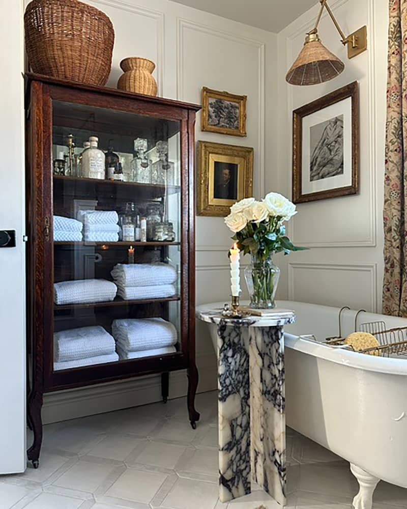 Curio cabinet in newly remodeled bathroom.
