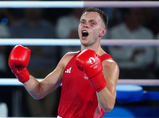 Team GB boxer Lewis Richardson celebrates winning bronze at the Paris Olympics