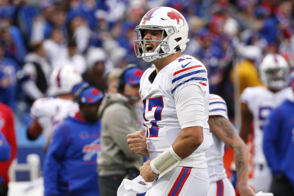 Buffalo Bills quarterback Josh Allen (17) celebrates after his touchdown during the second half of an NFL football game against the Miami Dolphins, Sunday, Oct. 31, 2021, in Orchard Park, N.Y. (AP Photo/Jeffrey T. Barnes)