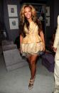 <p>Beyonce didn’t let a baby bump get in the way of Fashion Week, taking to the SS11 New York shows in an extremely short nude design by Vera Wang. <i>[Photo: Getty]</i> </p>