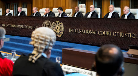 FILE PHOTO: Members of the International Court of Justice conduct a hearing on alleged violations of the 1955 Treaty of Amity between Iran and the United States, August 27, 2018. REUTERS/Piroschka van de Wouw/File Photo