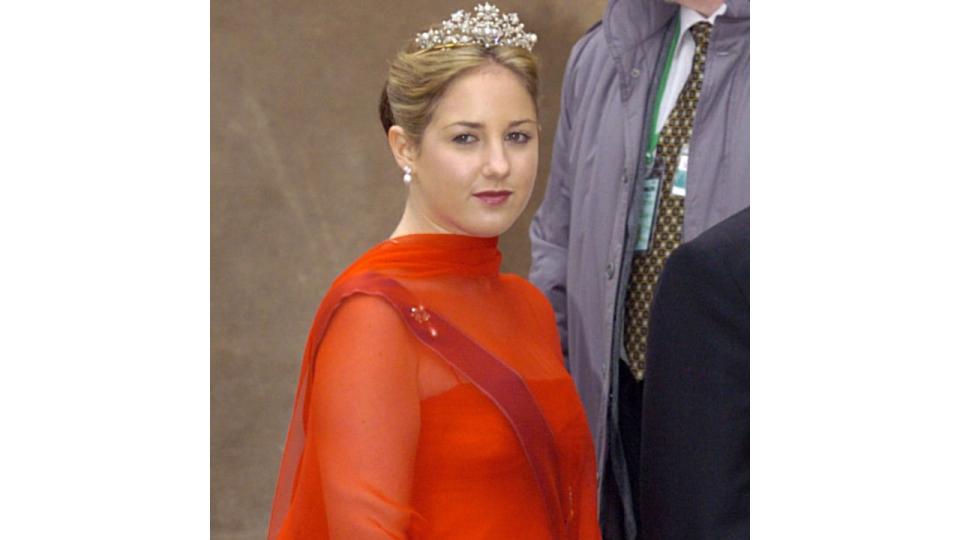 Princess Theodora in a tiara and a red dress