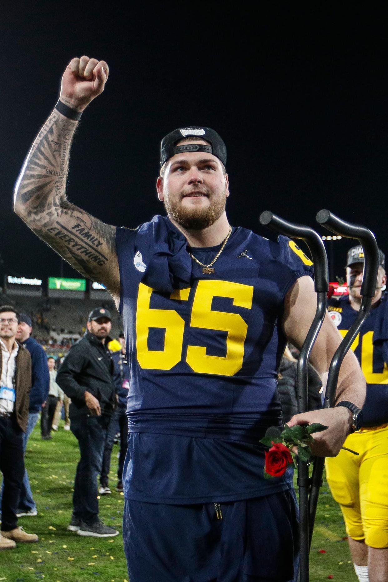 Michigan's Zak Zinter celebrates a 27-20 Rose Bowl win over Alabama at the 2024 Rose Bowl in Pasadena, Calif., on Monday, Jan. 1, 2024.