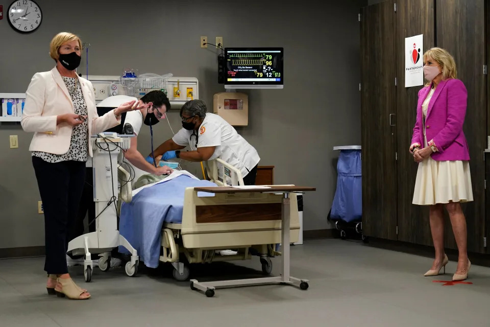 Sauk Valley Community College nursing students work on a mannequin patient as SVCC Dean of Health Christy Vincent talks about the school&#39;s nursing program with First Lady Jill Biden during a tour of the school in Dixon, Illinois, on April 19, 2021. (Photo by Susan Walsh / POOL / AFP)