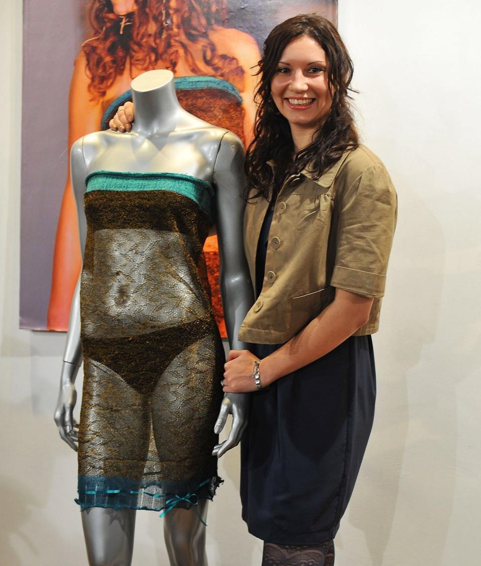 Todd wearing the dress at the Passion For Fashion Auction at La Galleria in 2011