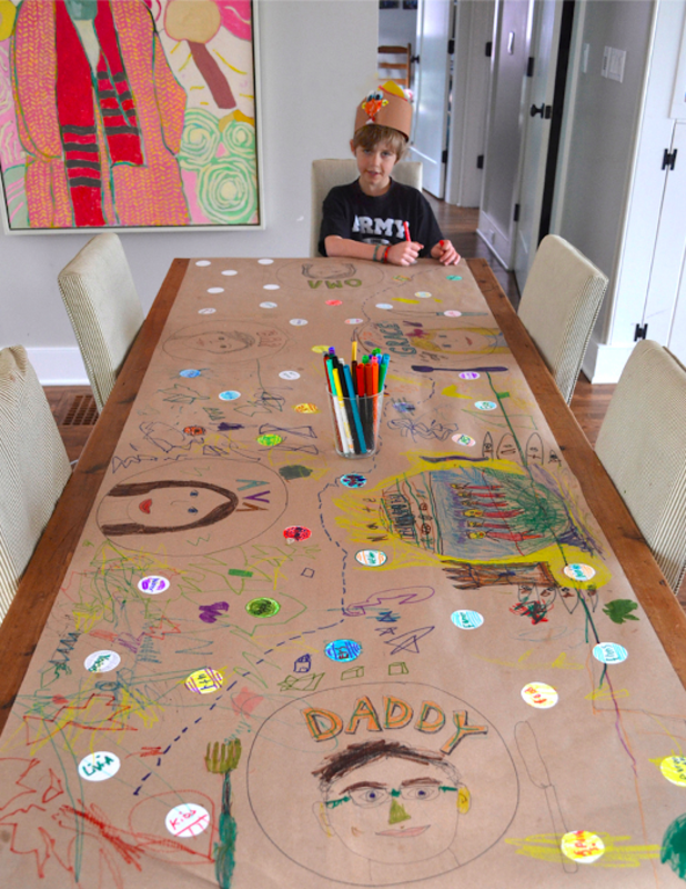 <p>Art Bar Blog</p><p>Don’t buy a tablecloth for Thanksgiving this year—have your kids design one instead! <a href="https://www.artbarblog.com/kid-made-thankful-table/" rel="nofollow noopener" target="_blank" data-ylk="slk:Art Bar Blog;elm:context_link;itc:0;sec:content-canvas" class="link rapid-noclick-resp"><em>Art Bar Blog</em></a> tells you what you’ll need for this fun craft.</p>