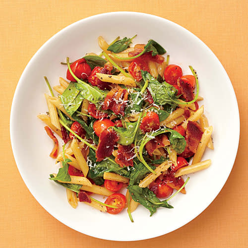 <p>We love the look of mezze penne, a smaller version of regular penne, but you can use any short pasta you like. The “lettuce” in this BLT is actually tender baby spinach. You could also substitute peppery arugula or even baby kale.</p> <p><a rel="nofollow noopener" href="http://www.myrecipes.com/recipe/blt-pasta" target="_blank" data-ylk="slk:View Recipe: BLT Pasta;elm:context_link;itc:0;sec:content-canvas" class="link ">View Recipe: BLT Pasta</a></p>