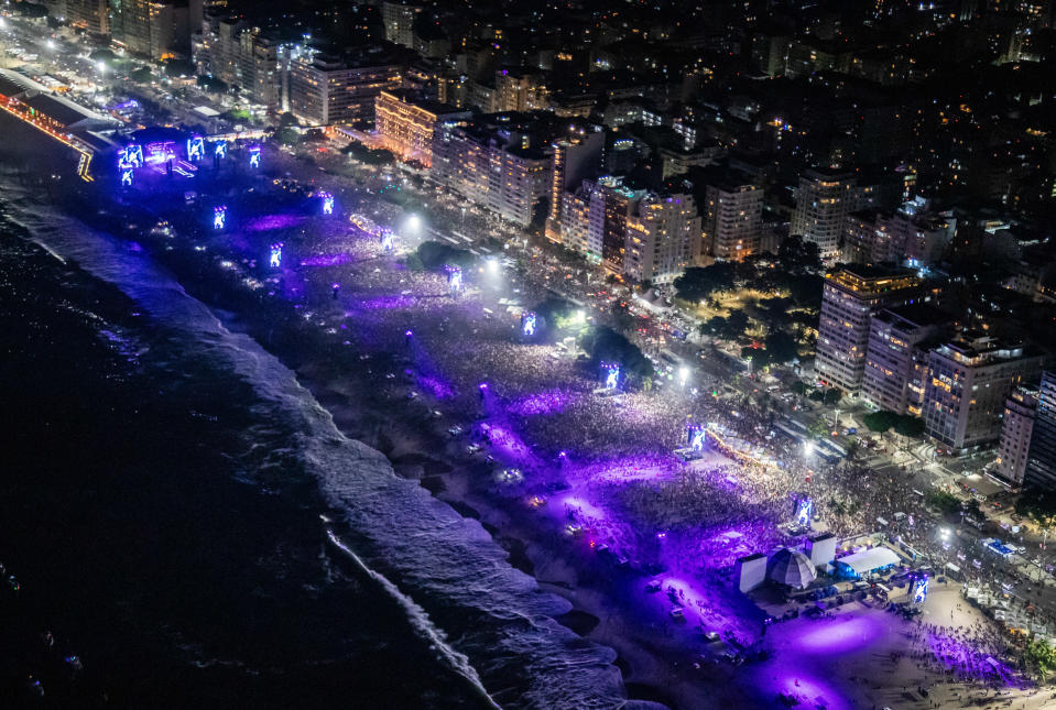 RIO DE JANEIRO, BRAZIL - MAY 04: (EDITOR’S NOTE: This Handout image/clip was provided by a third-party organization and may not adhere to Getty Images’ editorial policy.) In this handout image, aerial view of Copacabana Beach packed by concertgoers during Madonna's massive free show to close "The Celebration Tour" on May 04, 2024 in Rio de Janeiro, Brazil. (Photo by Fernando Maia/Riotur via Getty Images)