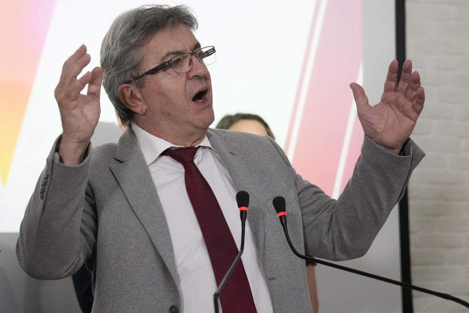 Hard-left leader Jean-Luc Melenchon delivers a speech at his election night headquarters after the first round of the parliamentary election Sunday, June 12, 2022 in Paris. Projections show French President Macron is expected to keep a parliamentary majority after 1st round of voting. (AP Photo/Christophe Ena)