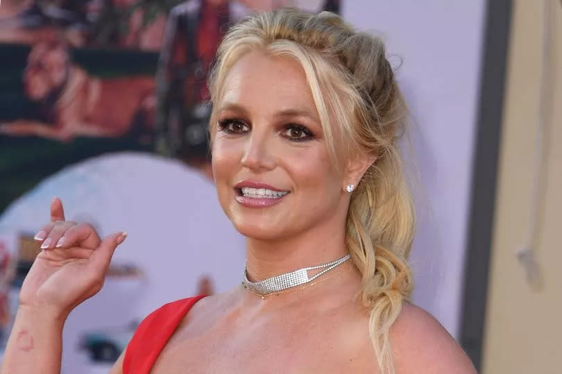 Britney Spears was escorted to an ambulance, but did not require any hospital treatment, according to reports