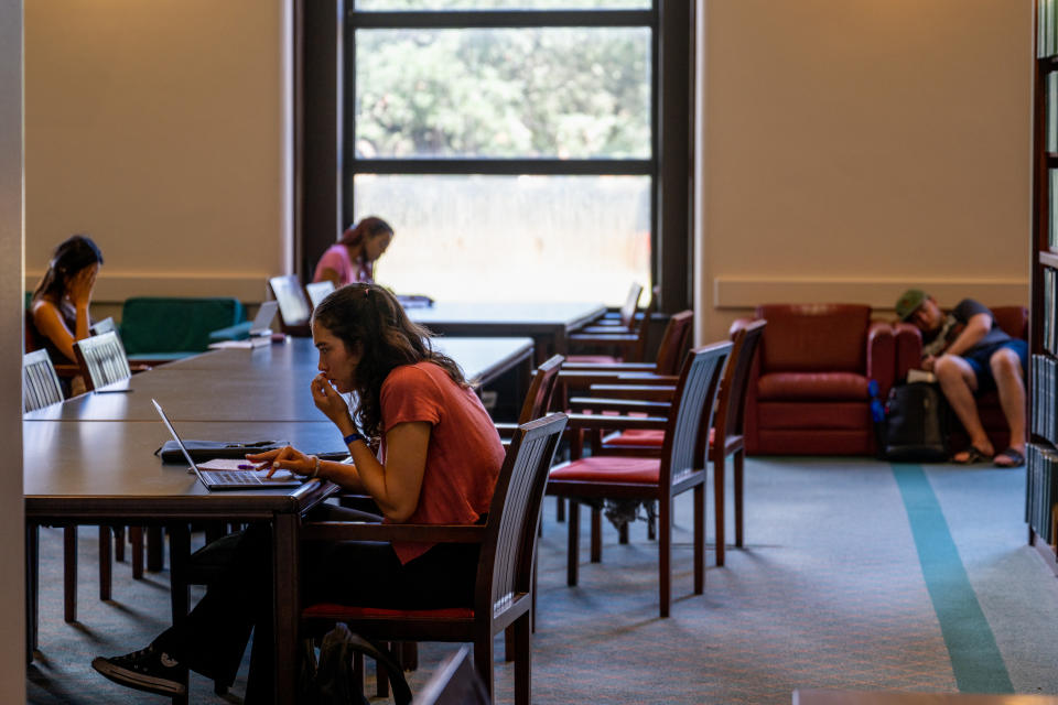 Students study in the Rice University Library on August 29, 2022 in Houston, Texas. U.S. President Joe Biden had announced a three-part plan that will forgive hundreds of billions of dollars in federal student loan debt. Since announced, the plan has sparked controversy as critics have begun questioning its fairness, and addressing concerns over its impact on inflation. (Credit: by Brandon Bell/Getty Images)