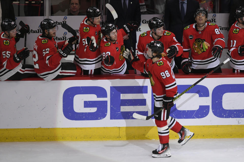 Chicago Blackhawks' Connor Bedard (98) is congratulated for his goal against the Anaheim Ducks during the second period of an NHL hockey game Tuesday, March 12, 2024, in Chicago. (AP Photo/Paul Beaty)