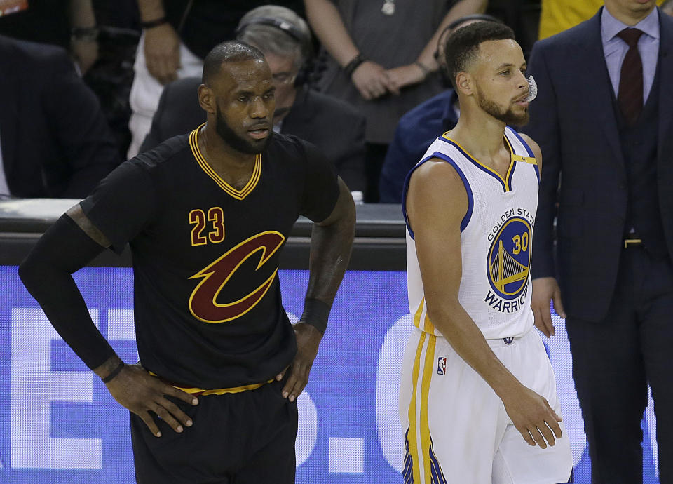 LeBron James and Stephen Curry will again meet on Christmas. (AP)