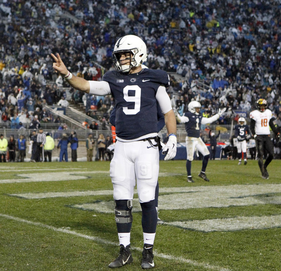Penn State quarterback Trace McSorley (9) reacts after scoring his second rushing touchdown against Maryland on Saturday, Nov. 24, 2018. (AP Photo/Chris Knight)