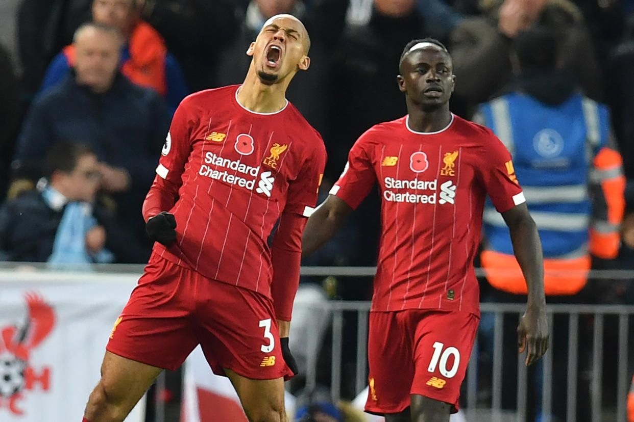 Fabinho (3) lets out a roar of celebration after scoring against Manchester City during Liverpool's 3-1 win on Sunday. (Photo by PAUL ELLIS/AFP via Getty Images)