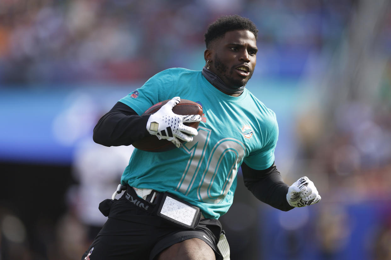 ORLANDO, FLORIDA - FEBRUARY 04: Tyreek Hill #10 of the Miami Dolphins and AFC runs with the ball during the first half of the 2024 NFL Pro Bowl Games at Camping World Stadium on February 04, 2024 in Orlando, Florida. (Photo by Mike Ehrmann/Getty Images)
