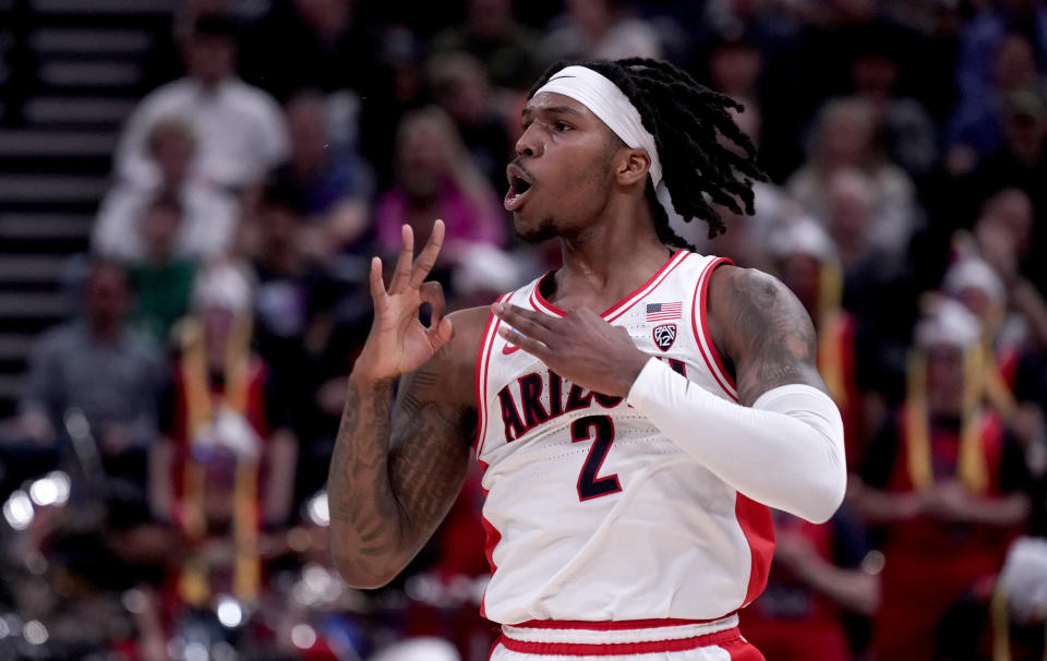 March 23, 2024;  Salt Lake City, UT, USA;  Arizona Wildcats guard Caleb Love (2) reacts after a basket in the first half of the second round of the 2024 NCAA Tournament against the Dayton Flyers at Vivint Smart Home Arena-Delta Center.  Mandatory credit: Gabriel Mayberry-USA TODAY Sports