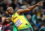 Usain Bolt of Jamaica celebrates after crossing the finish line to win the gold medal in the Men's 100m Final on Day 9 of the London 2012 Olympic Games at Olympic Stadium on August 5, 2012 in London, England. (Photo by Pascal Le Segretain/Getty Images)<br><br> <b>Related story:</b> <a href="http://yhoo.it/Qq1FGL" rel="nofollow noopener" target="_blank" data-ylk="slk:Usain Bolt is a legend, even if the IOC disagrees;elm:context_link;itc:0;sec:content-canvas" class="link ">Usain Bolt is a legend, even if the IOC disagrees</a>