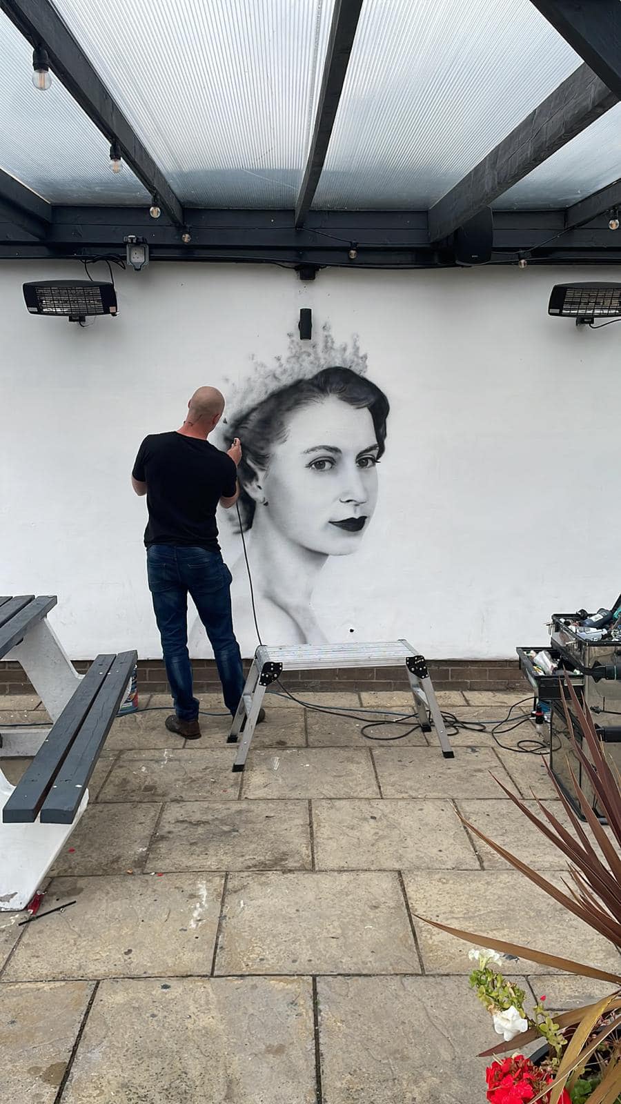 Scott Wilcock's permanent tribute of the Queen at the Queens Arms pub in Manchester.