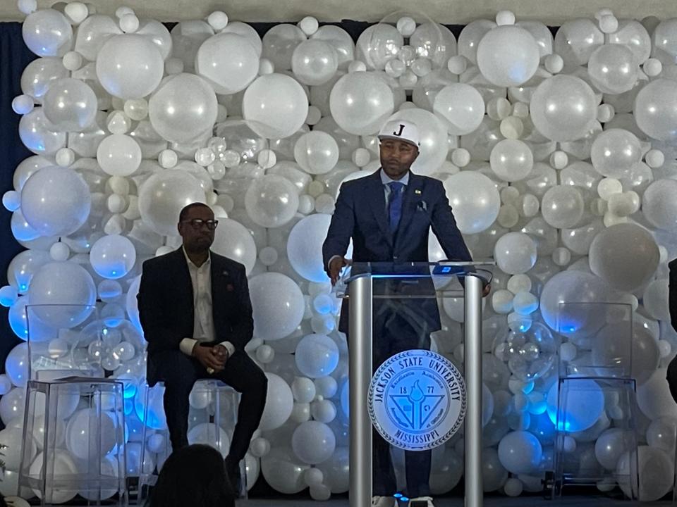 Jackson State basketball coach Mo Williams (right) speaks at his introductory press conference at JSU on Monday