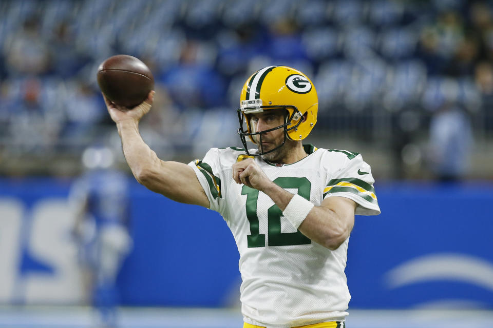 Green Bay Packers quarterback Aaron Rodgers throws during pregame of an NFL football game against the Detroit Lions, Sunday, Nov. 6, 2022, in Detroit. (AP Photo/Duane Burleson)