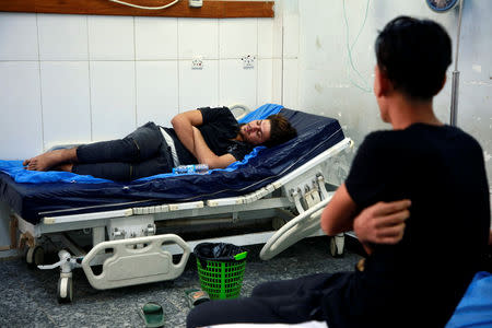 Ahmed Malik, 32, lies inside a hospital after being poisoned by water pollution in Basra, Iraq September 13, 2018. REUTERS/Alaa al-Marjani/Files