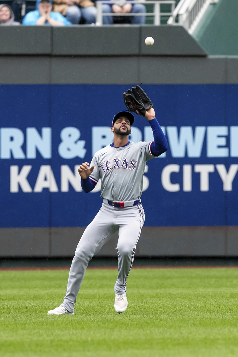 Texas Rangers' outfielder Leody Taveras catches a ball or an out during the first inning of a baseball game against the Kansas City Royals, Sunday, May 5, 2024, in Kansas City, Mo. (AP Photo/Nick Tre. Smith)