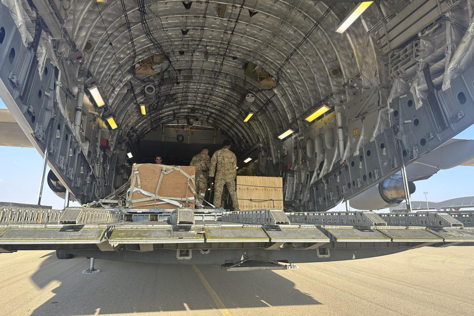 A U.S. C-17 sits at the Nevatim Air Base in the desert in Israel, Friday, Oct. 13, 2023. The aircraft arrived Friday with crates of American munitions for Israel. U.S. Defense Secretary Lloyd Austin, the second high-level U.S. official sent by President Joe Biden to visit Israel in two days, visited the base Friday afternoon and saw firsthand some of the weapons and security assistance that Washington rapidly delivered to Israel after it was attacked. (AP Photos/Lolita Baldor)