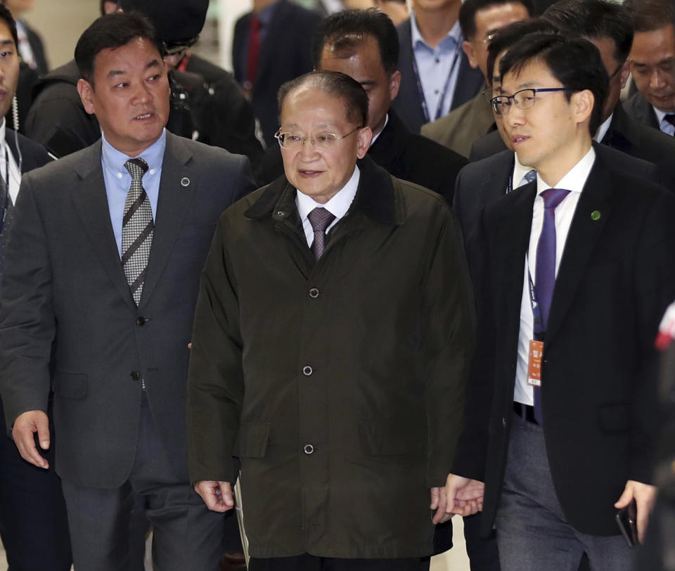 North Korean vice chairman of the Korea Asia-Pacific Peace Committee Ri Jong Hyok, center, arrives at the Incheon International Airport in Incheon, South Korea, Wednesday, Nov. 14, 2018. A five-member North Korean delegation is visiting South Korea to attend an academic forum on Japan's wartime actions. (Kim In-chul/Yonhap via AP)