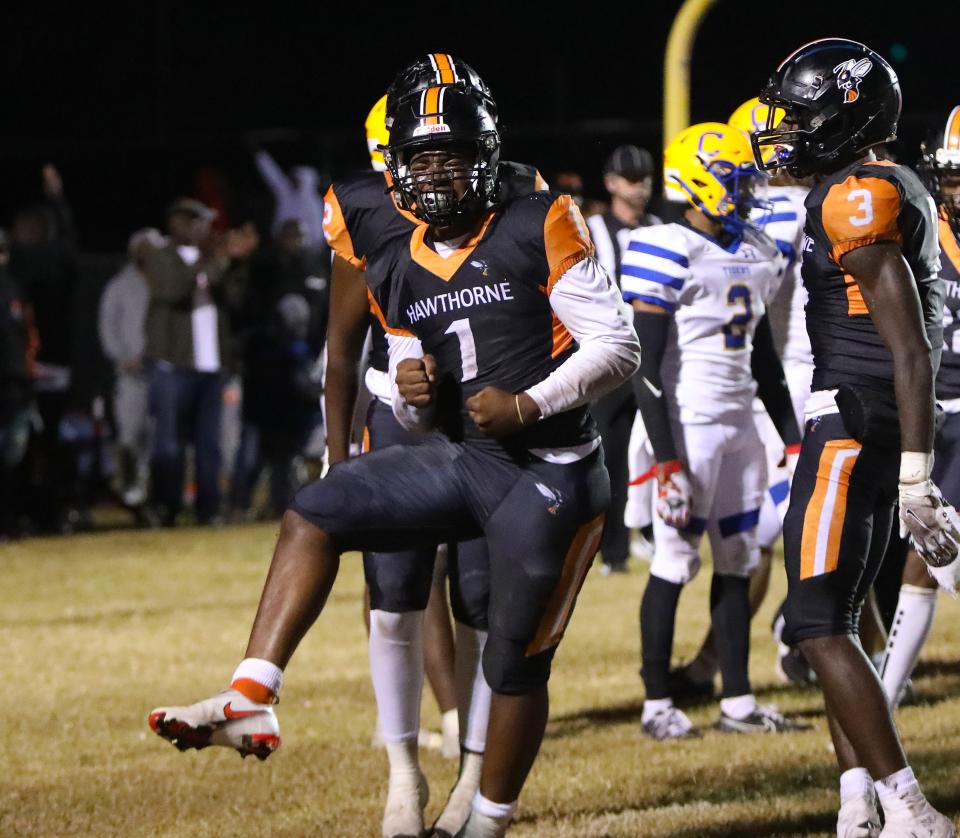 Tyler Jefferson (1) celebrates after making a touchdown during the semi-finals of the 1A state playoffs against Chipley, in Hawthorne Fla., Dec. 3, 2021. Jefferson transferred from Hawthorne to Columbia during the offseason.