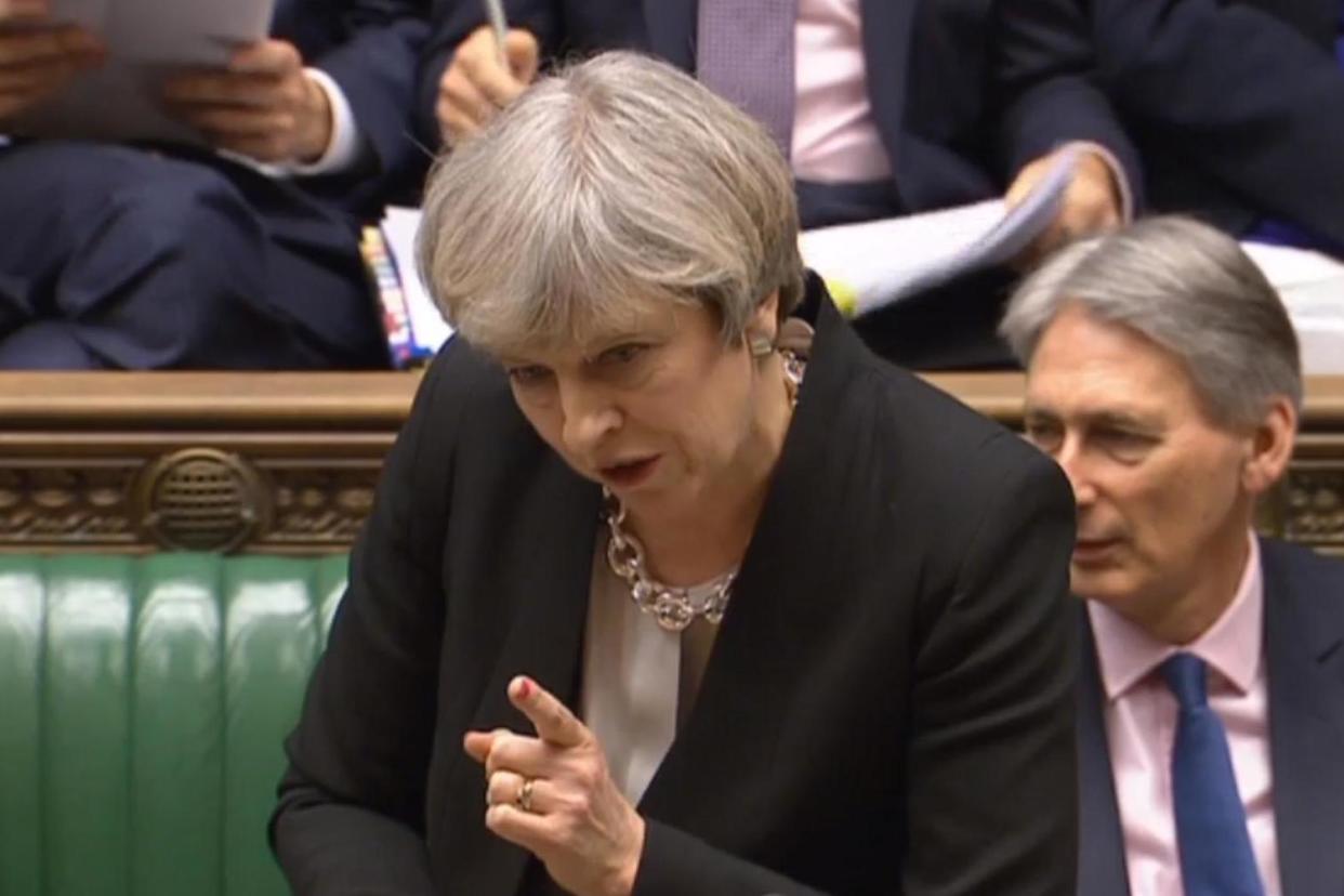 Pledge: Theresa May during Prime Minister's Questions: PA