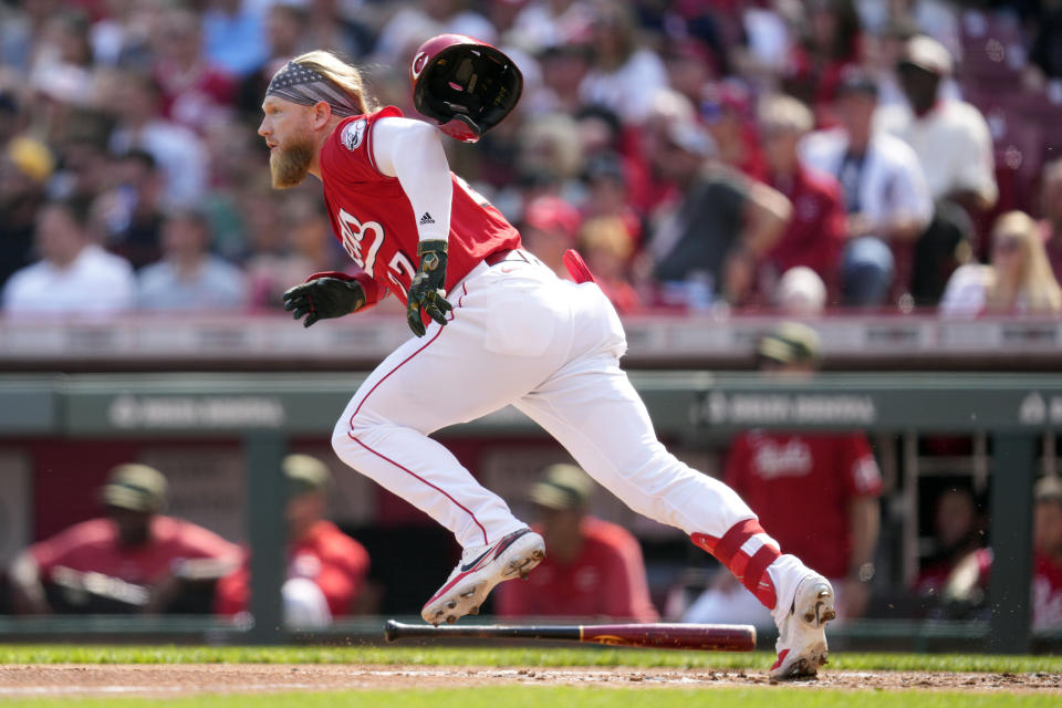 Cincinnati Reds' Jake Fraley watches his one-run single against the New York Yankees in the first inning of a baseball game in Cincinnati, Saturday, May 20, 2023. (AP Photo/Jeff Dean)