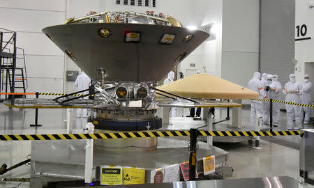FILE PHOTO: NASA's InSight spacecraft, destined for the Elysium Planitia region located in Mars' northern hemisphere, undergoes final preparations at Vandenberg Air Force Base, California, U.S., April 6, 2018. REUTERS/Gene Blevins/File Photo