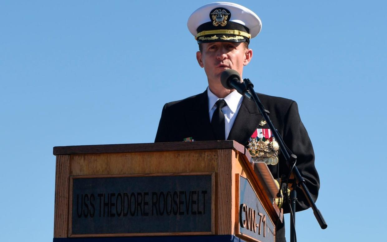 Captain Brett Crozier addressing the crew of the aircraft carrier USS Theodore Roosevelt in 2019 - AFP PHOTO/MCS 3rd Class Sean Lynch/US Navy