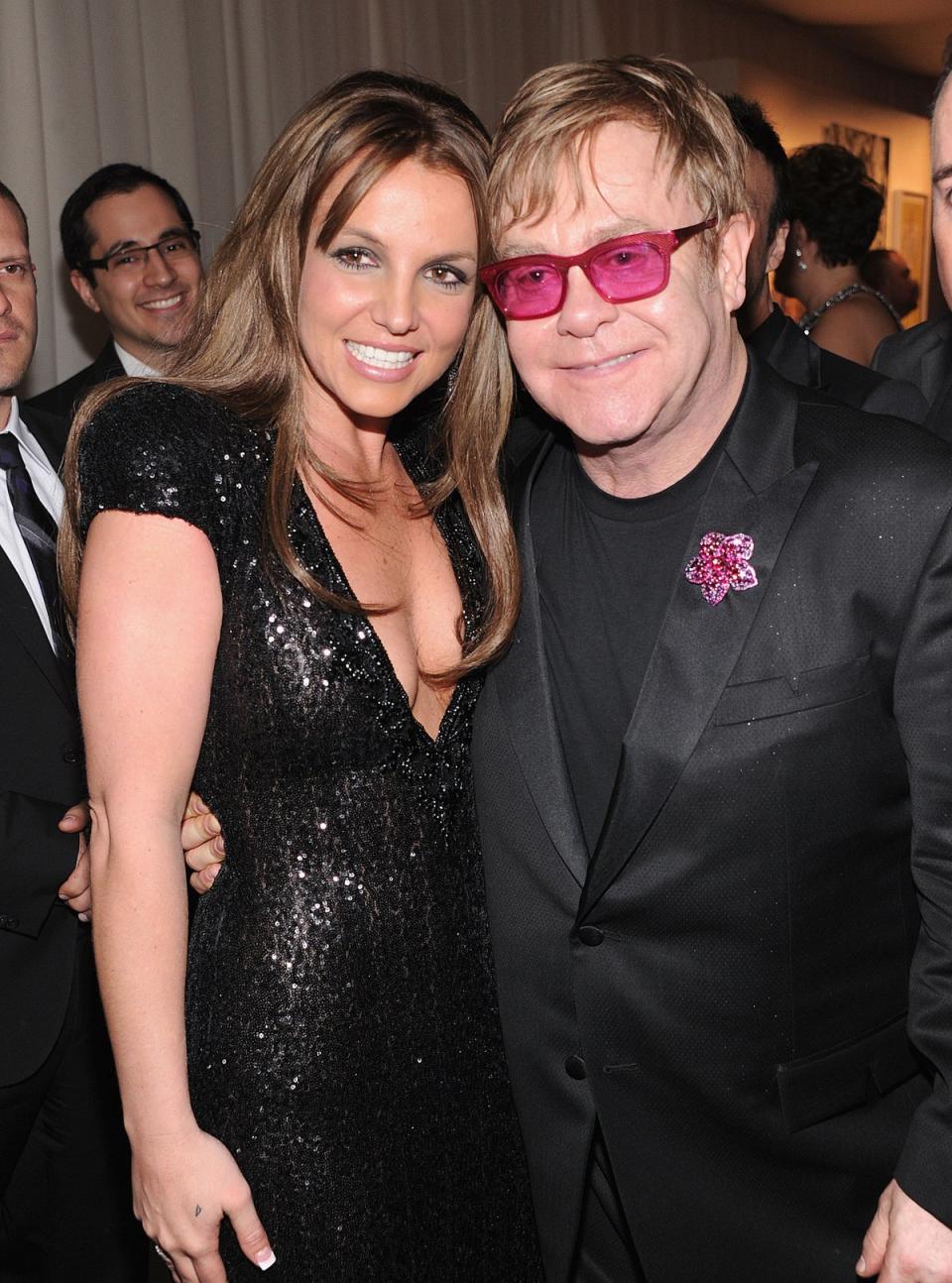 Spears collaborated with Sir Elton John last year on Hold Me Closer. Pictured together in 2013 (Getty Images for EJAF)