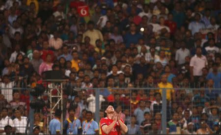 Cricket - England v West Indies - World Twenty20 cricket tournament final - Kolkata, India - 03/04/2016. England's Ben Stokes takes a catch to dismiss West Indies Johnson Charles. REUTERS/Adnan Abidi