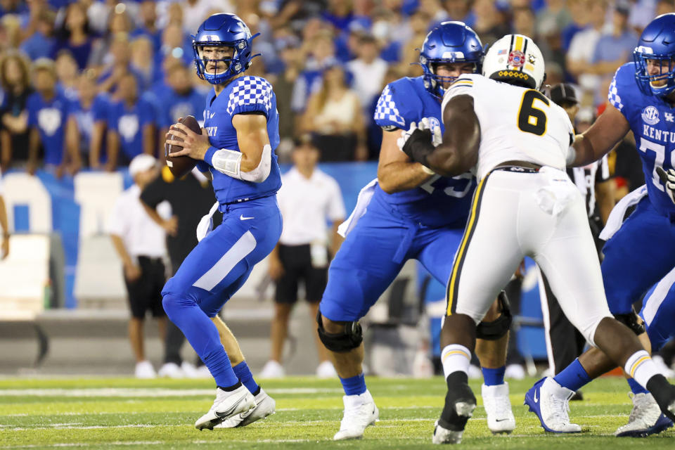 Kentucky quarterback Will Levis (7) looks for an open receiver during the first half of an NCAA college football game against Missouri in Lexington, Ky., Saturday, Sept. 11, 2021. (AP Photo/Michael Clubb)