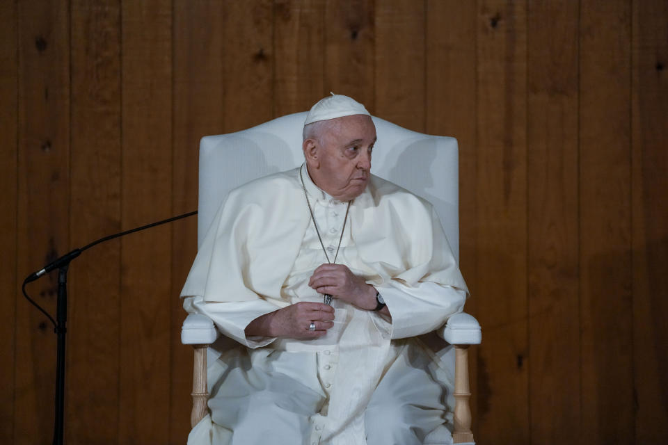 Pope Francis attends a meeting with representatives of some aid and charity centers in the parish of Serafina ahead of Sunday's 37th World Youth Day in Lisbon, Friday, Aug. 4, 2023. Francis is in Portugal through the weekend to preside over the jamboree that St. John Paul II launched in the 1980s to encourage young Catholics in their faith. The Argentine Jesuit has picked up John Paul's mantle with gusto as he seeks to inspire the next generation to rally behind his key social justice and environmental priorities.(AP Photo/Gregorio Borgia)