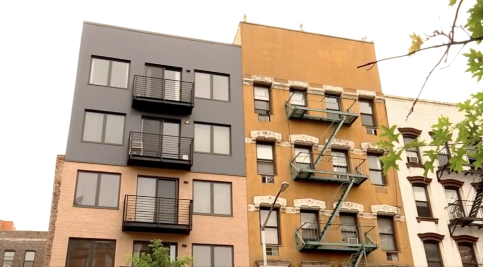 Two East Village apartment buildings in New York are pictured.