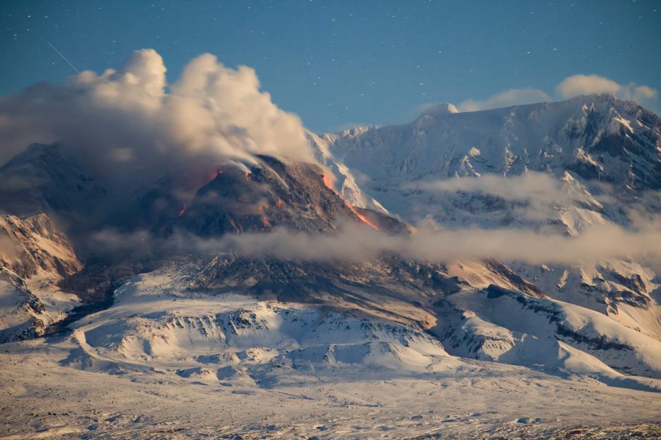 Lava streams and smoke from an eruption late last year.