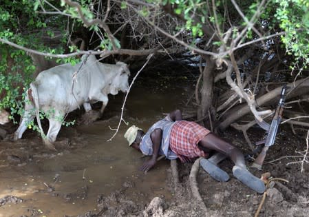 The Wider Image: When raiders menace in northern Kenya, grab your guns