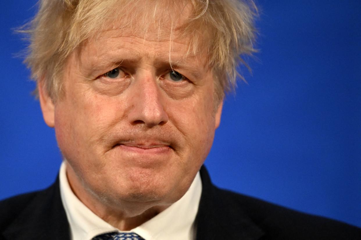 Britain's Prime Minister Boris Johnson speaks during a press conference in the Downing Street Briefing Room in central London on May 25, 2022, following the publication of the Sue Gray report. - UK Prime Minister Boris Johnson rejected calls to resign after an inquiry Wednesday found that he presided over a culture of lockdown-breaking parties that featured drunken fighting among staff. Johnson is among dozens of people in Downing Street who have received police fines for breaching Covid regulations since 2020 -- making Number 10 the most penalised address in the entire country. (Photo by Leon Neal / POOL / AFP) (Photo by LEON NEAL/POOL/AFP via Getty Images)